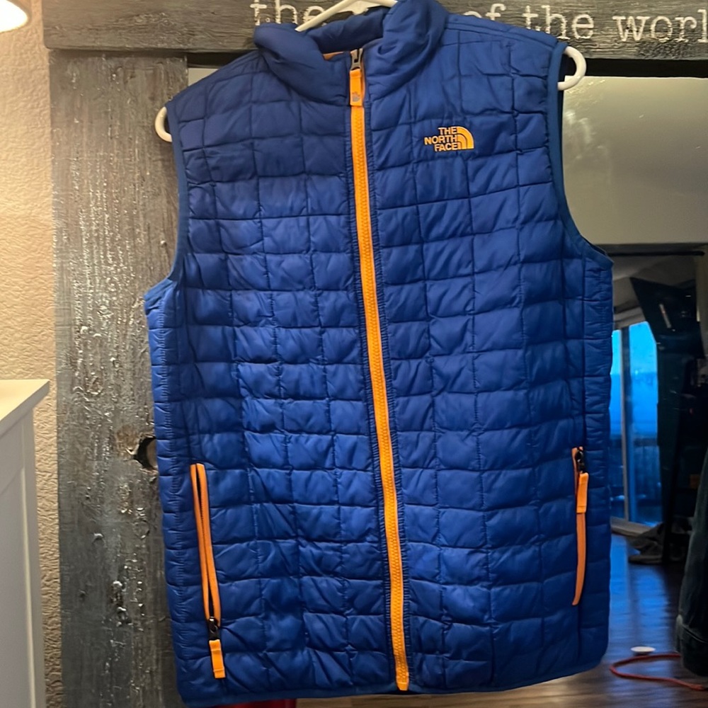 The North Face TNF blue packable ThermoBall vest. Size XL 18-20 big kids.